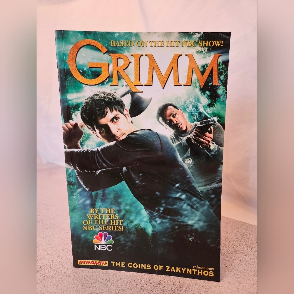 Grimm Volume 1: The Coins of Zakynthos, Paperback, New with Dented Cover See Pic